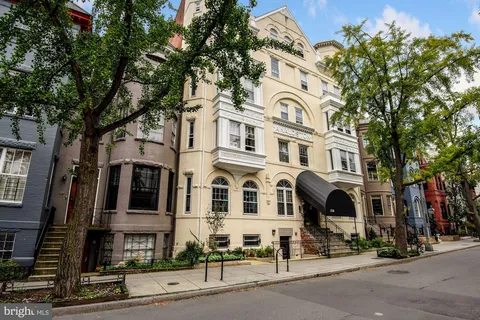 a view of a building with a street