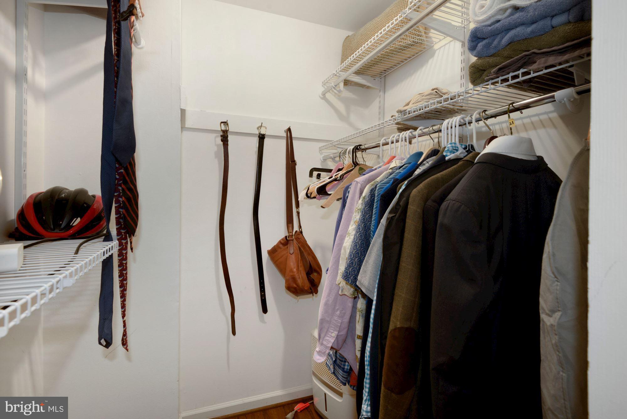 1718 Corcoran Street Northwest, Unit 5 Washington, DC 20009 - Photo 15 of 23 a view of walk in closet with clothes and shoes