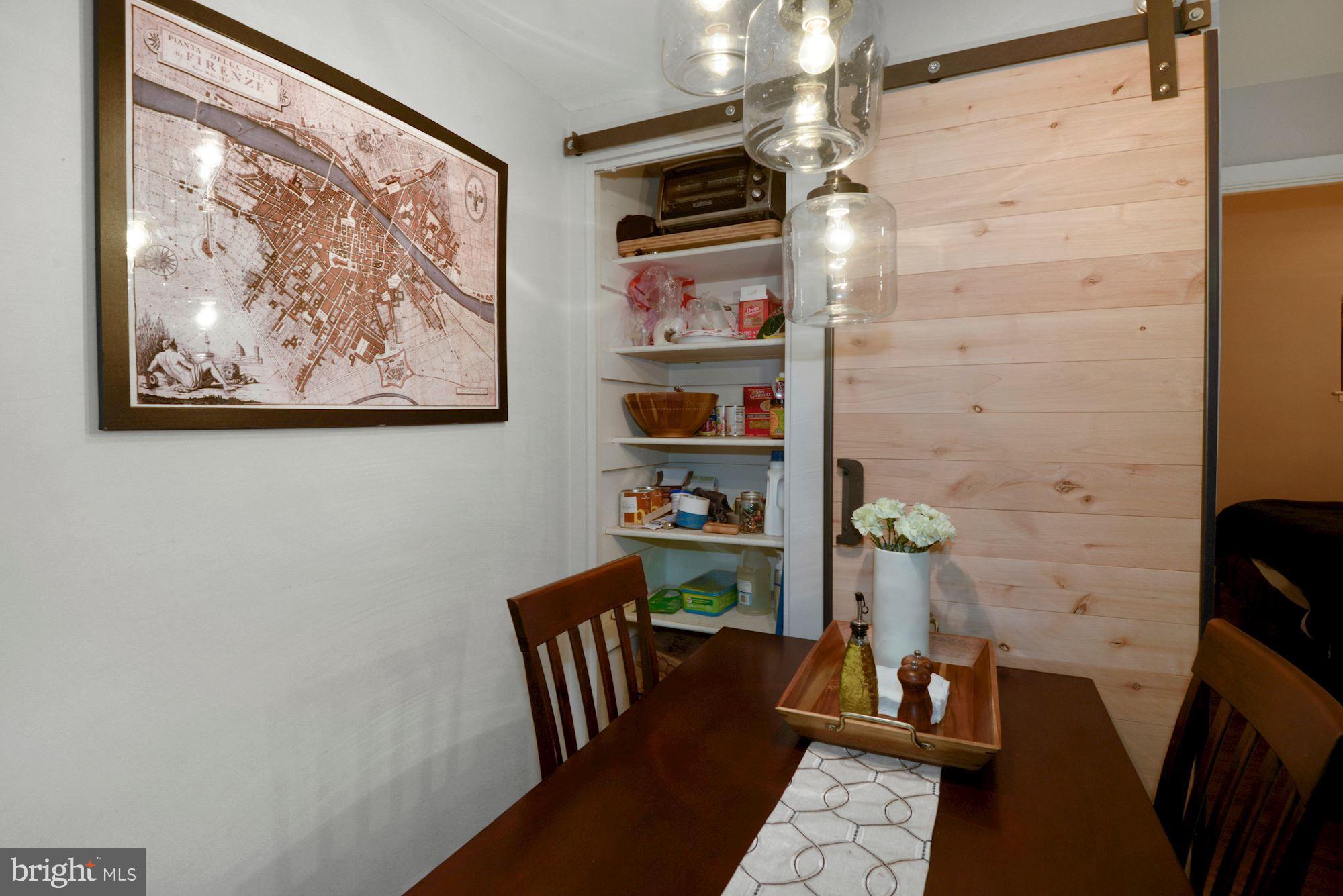 1718 Corcoran Street Northwest, Unit 5 Washington, DC 20009 - Photo 18 of 23 a view of a hallway with workspace
