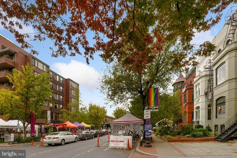 a view of street with sitting area