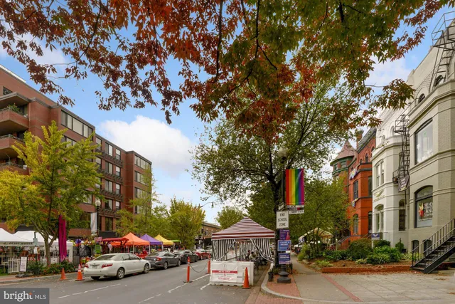 a view of street with sitting area
