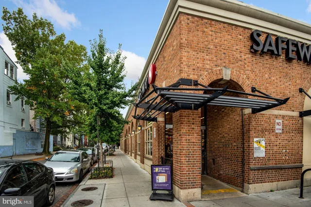 a view of street with sitting area