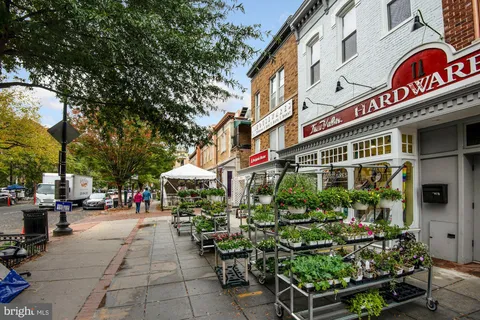 a view of street with small shops