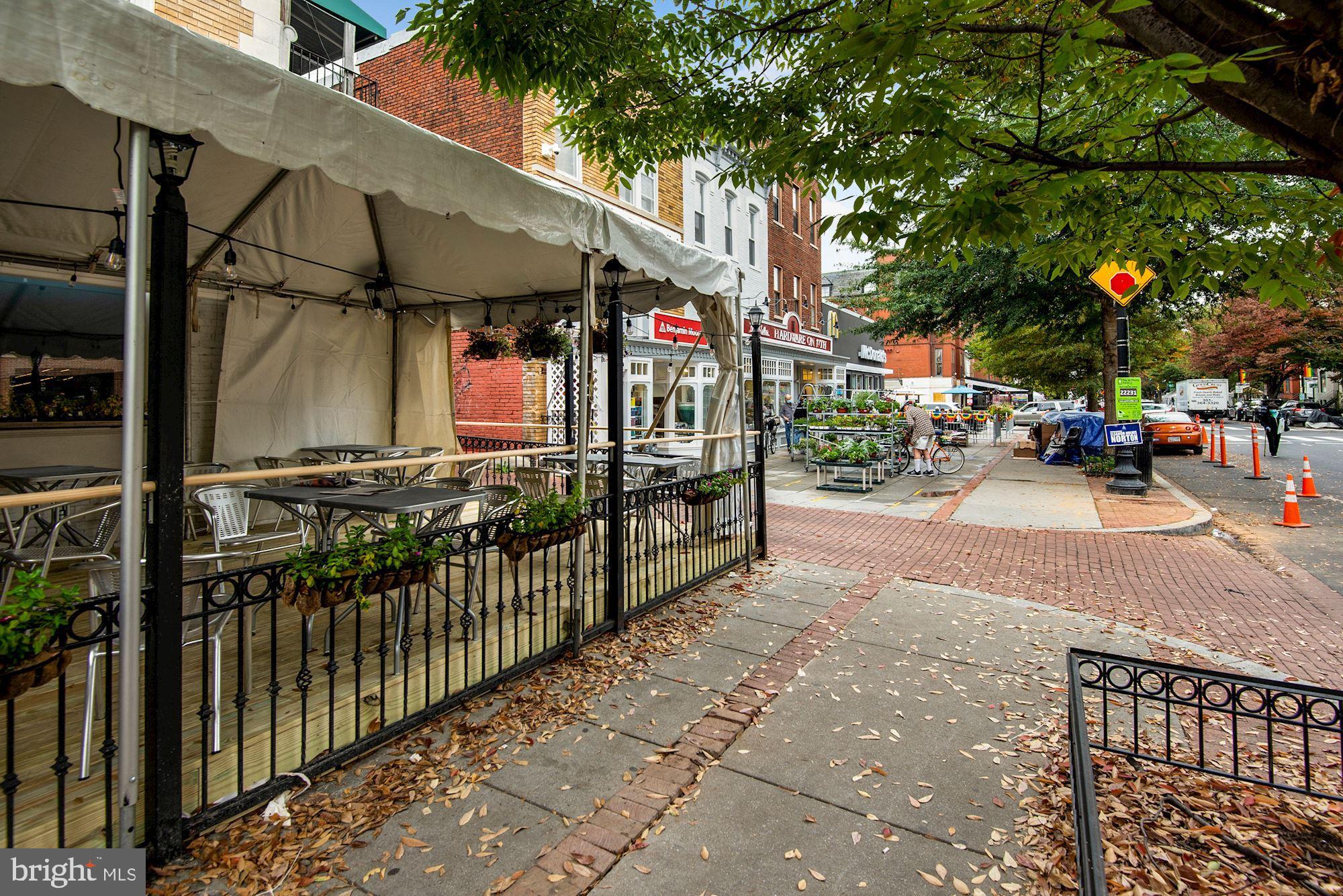 1718 Corcoran Street Northwest, Unit 5 Washington, DC 20009 - Photo 23 of 23 a view of street with small shops