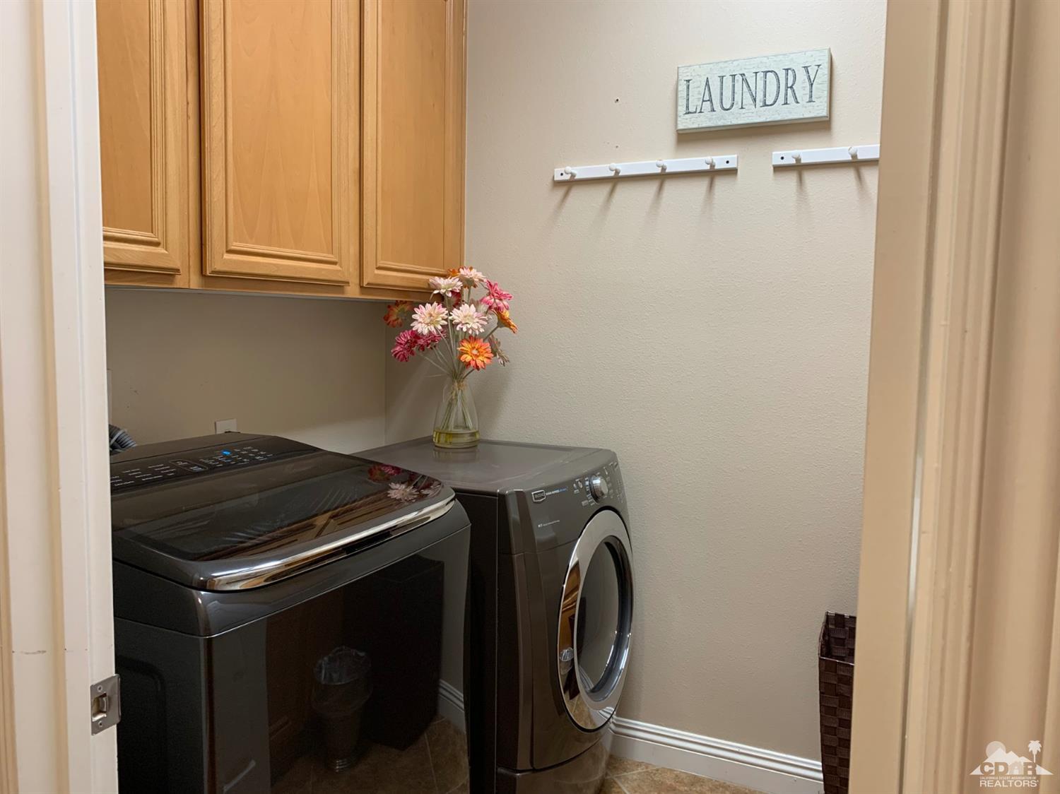 37503 Haweswater Road Indio, CA 92203 - Photo 14 of 19 a utility room with dryer and washer