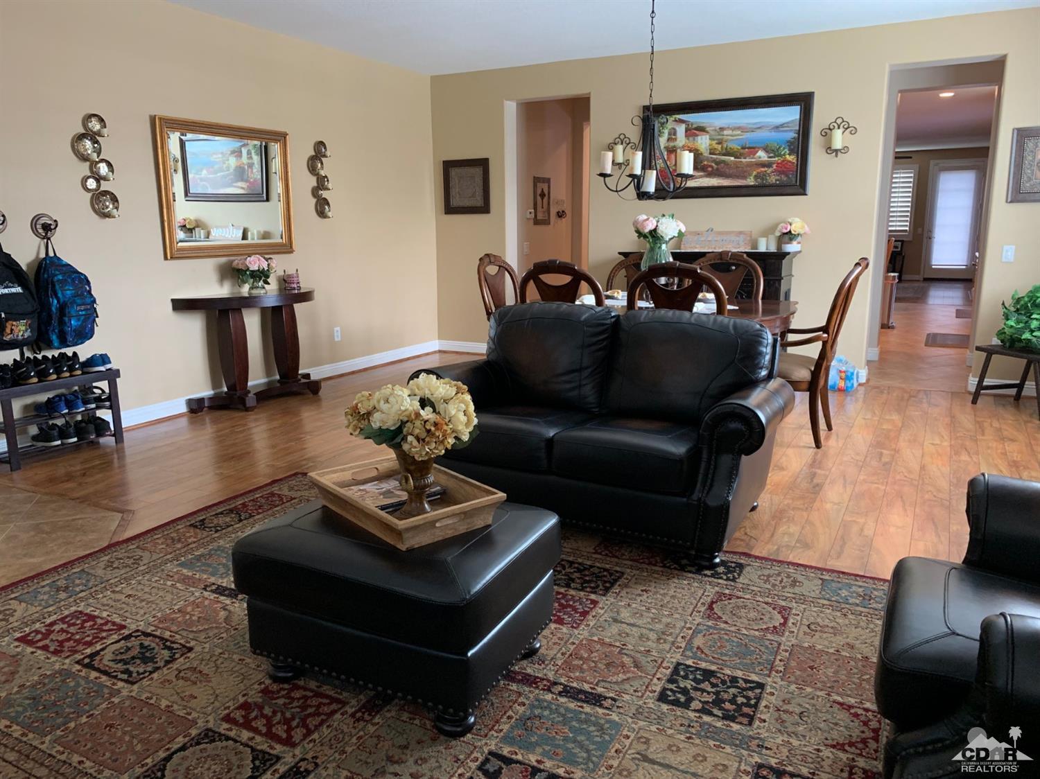 37503 Haweswater Road Indio, CA 92203 - Photo 4 of 19 a living room with furniture and wooden floor