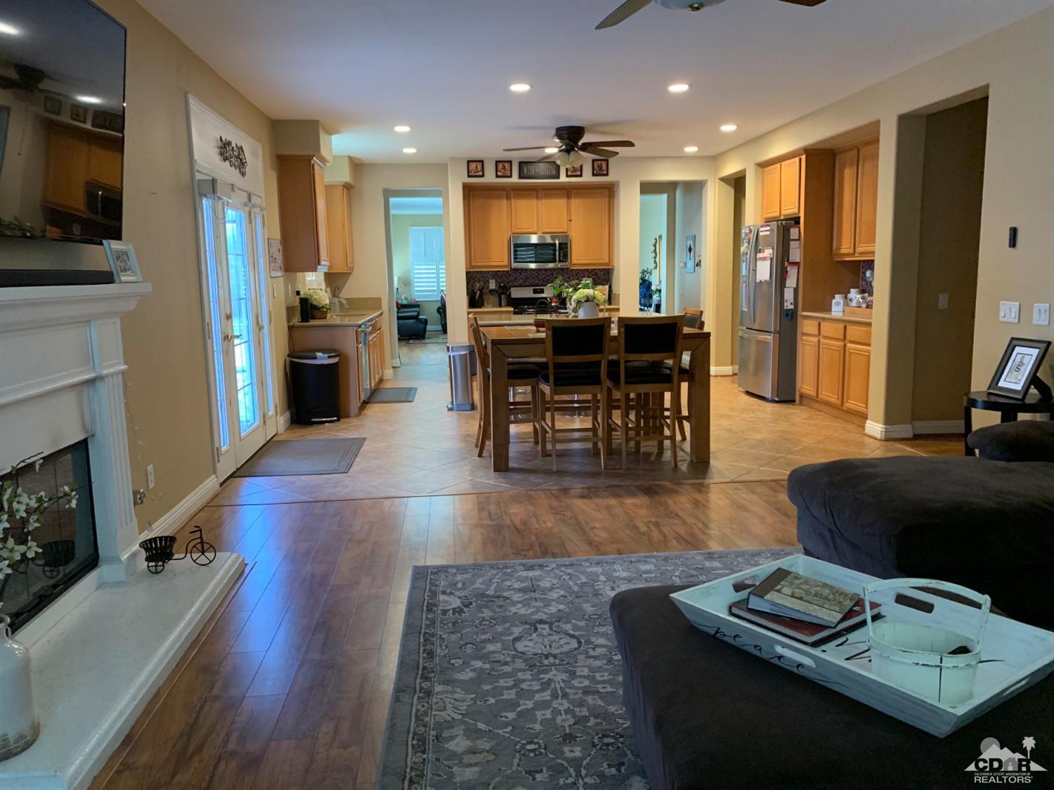 37503 Haweswater Road Indio, CA 92203 - Photo 6 of 19 a living room with furniture and kitchen view