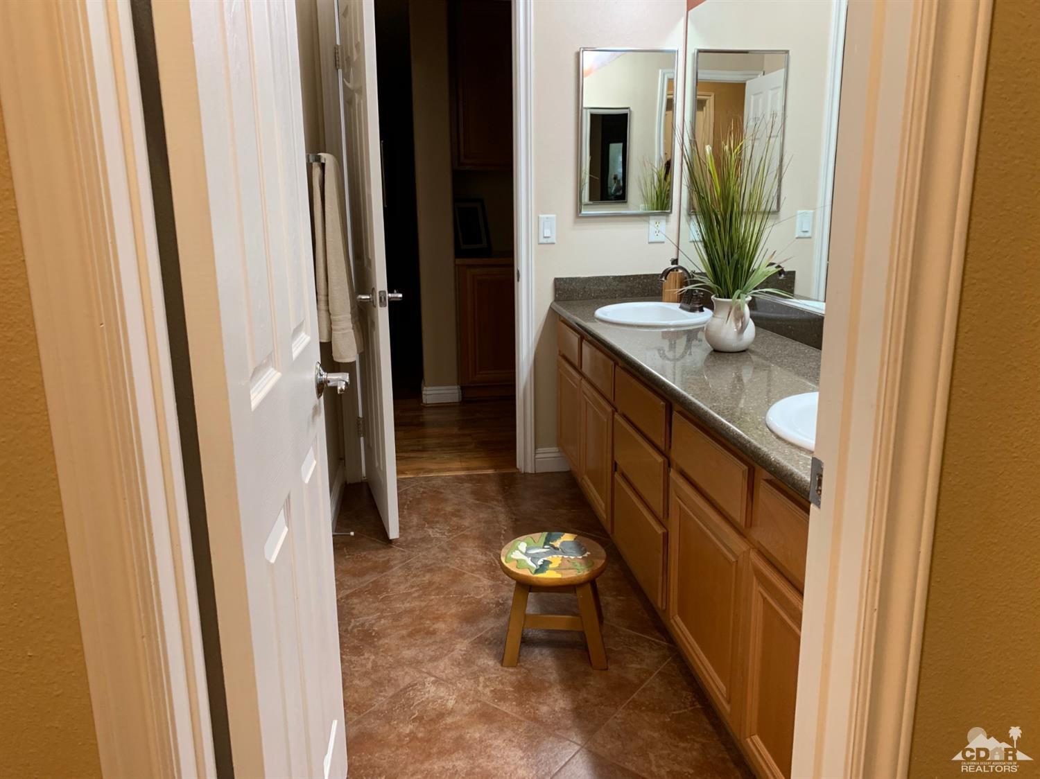 37503 Haweswater Road Indio, CA 92203 - Photo 8 of 19 a bathroom with a sink and a mirror