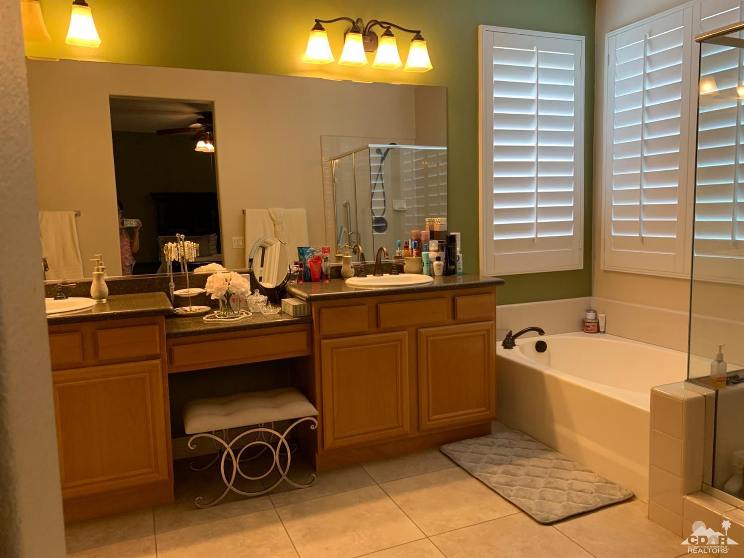 37503 Haweswater Road Indio, CA 92203 - Photo 10 of 19 a room with a chair and a table