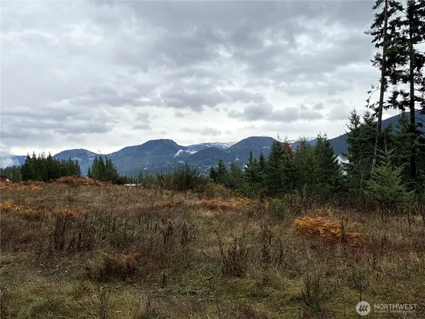 a view of mountain with lake view