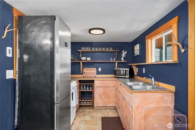 $635,000 | 5025 Mud Bay Road Northwest, Olympia, WA 98502