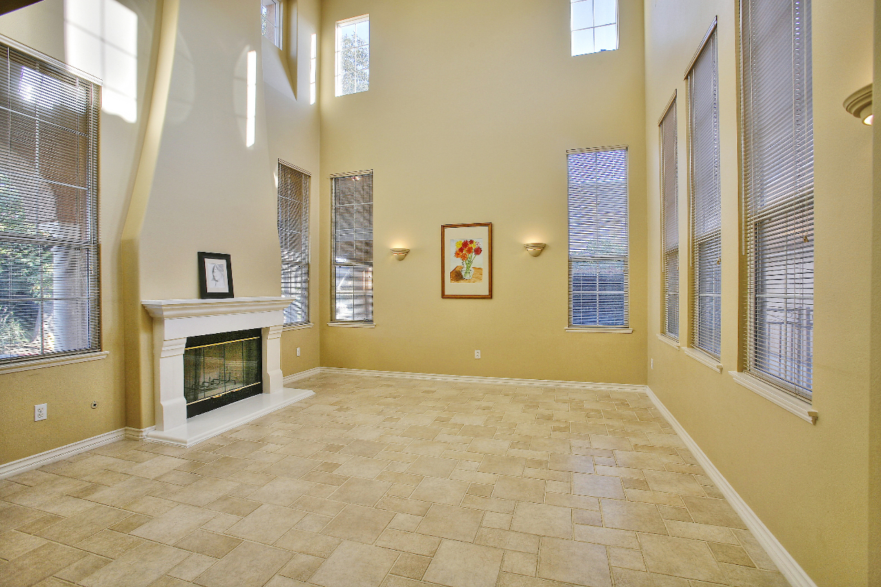 287 King Daniel Lane Goleta, CA 93117 - Photo 5 of 11 a view of an empty room with a fireplace and windows