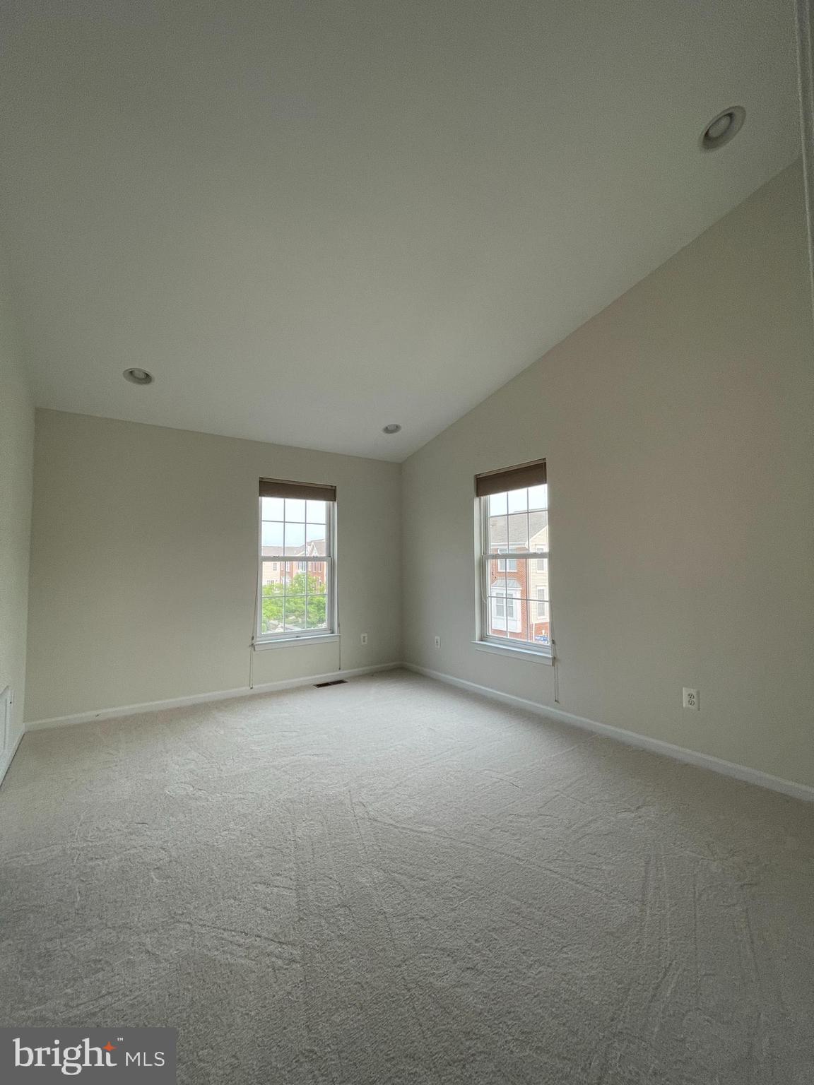 25111 Monteith Terrace Chantilly, VA 20152 - Photo 14 of 34 an empty room with a window and doors