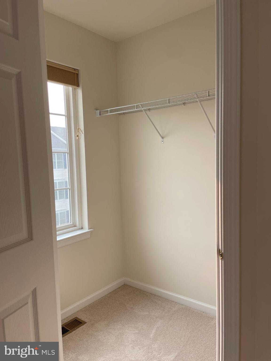 25111 Monteith Terrace Chantilly, VA 20152 - Photo 16 of 34 a view of an empty room with a window