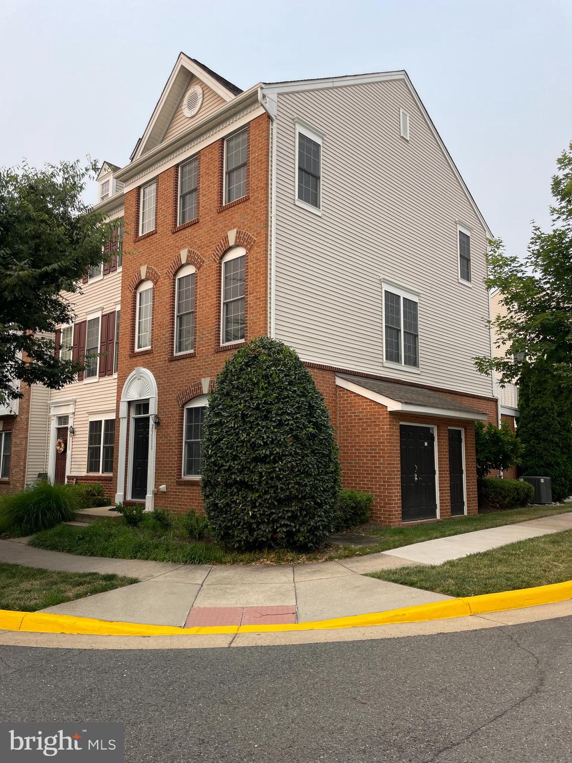 25111 Monteith Terrace Chantilly, VA 20152 - Photo 2 of 34 a view of a house with swimming pool and a yard