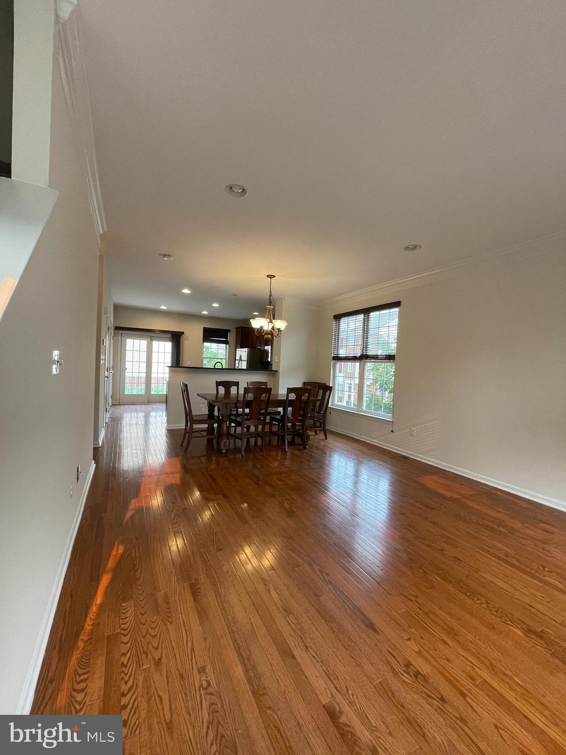 25111 Monteith Terrace Chantilly, VA 20152 - Photo 23 of 34 a living room with furniture and a wooden floor