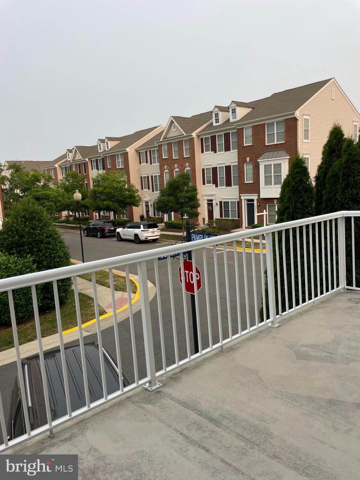 25111 Monteith Terrace Chantilly, VA 20152 - Photo 3 of 34 a view of a building from a balcony