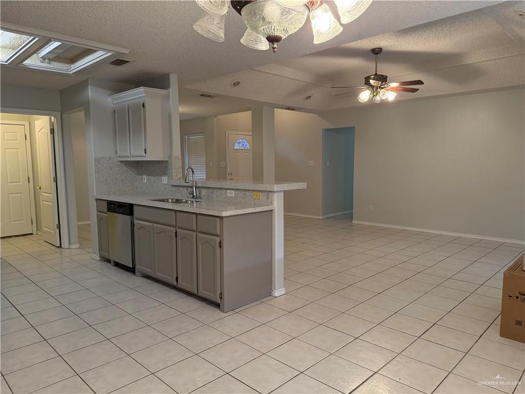 2517 Emory Avenue, Unit 60 McAllen, TX 78504 - Photo 3 of 12 a kitchen with a sink and cabinets
