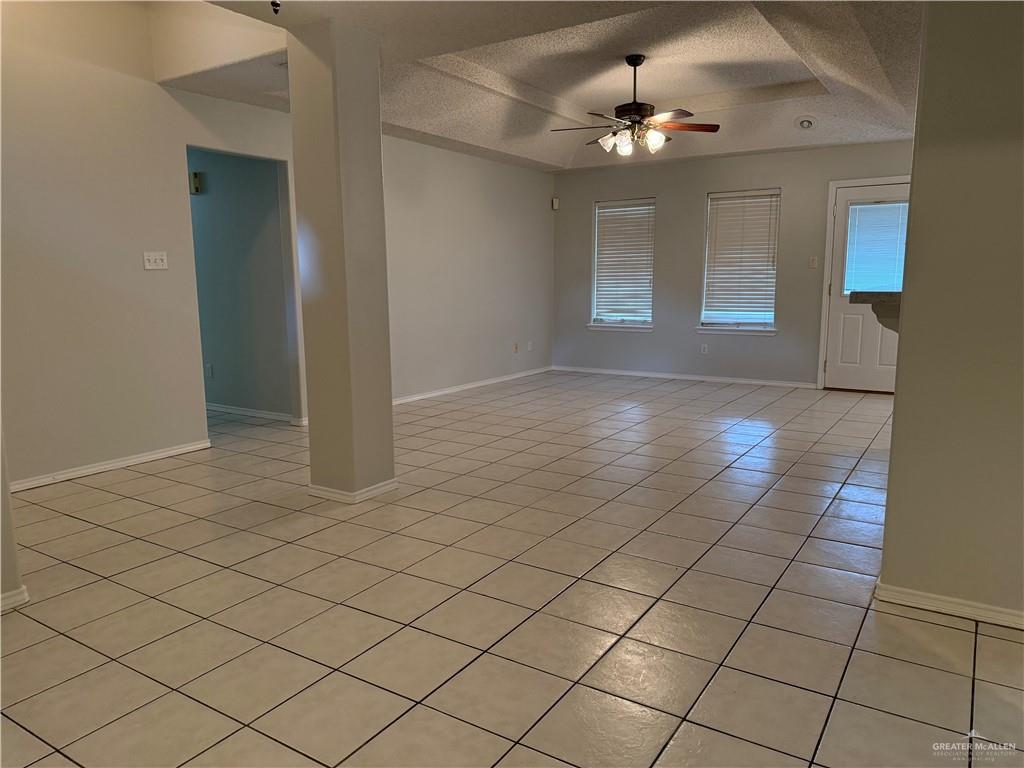2517 Emory Avenue, Unit 60 McAllen, TX 78504 - Photo 8 of 12 a view of an empty room with a chandelier fan