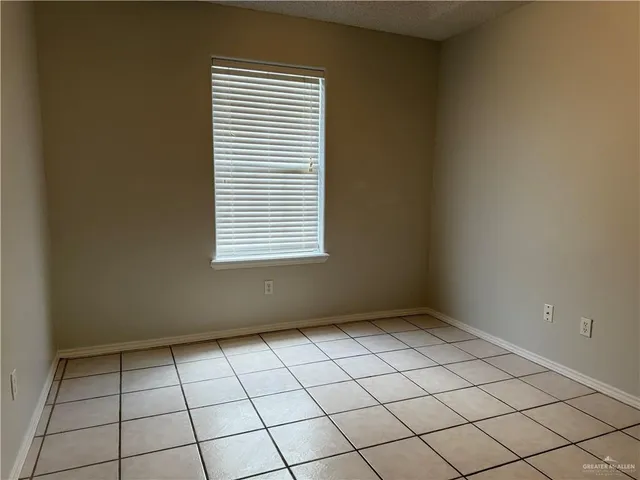 a view of an empty room with window