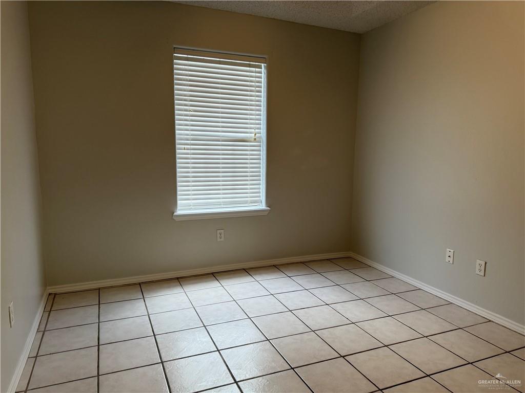 2517 Emory Avenue, Unit 60 McAllen, TX 78504 - Photo 9 of 12 a view of an empty room and window