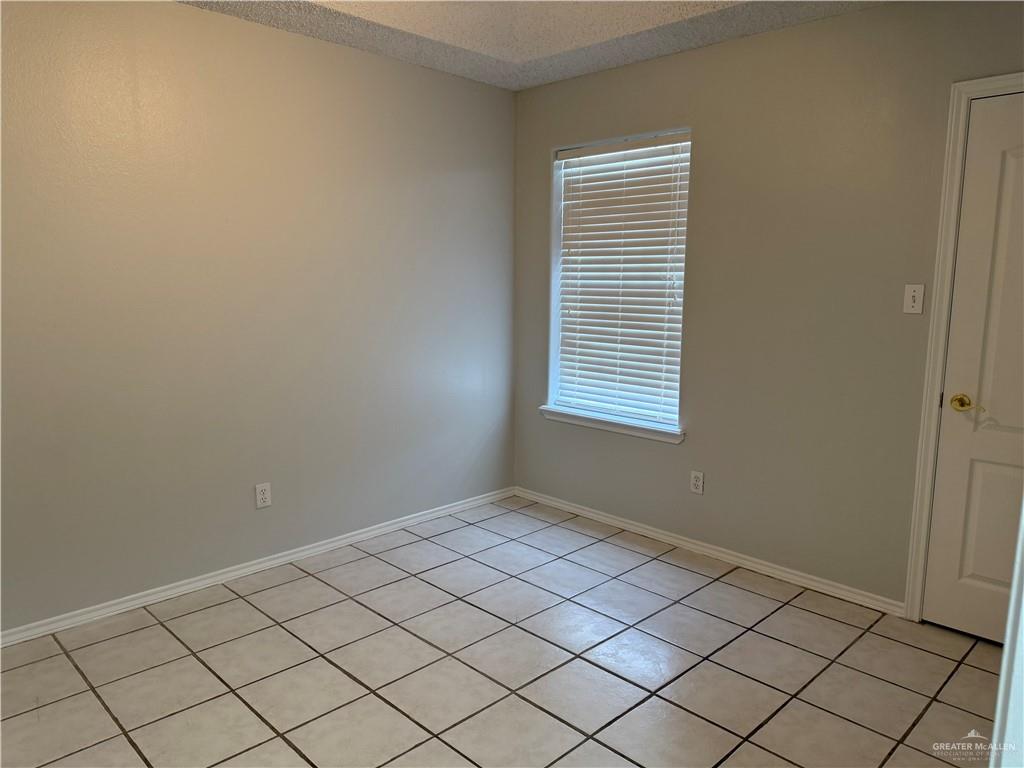 2517 Emory Avenue, Unit 60 McAllen, TX 78504 - Photo 10 of 12 a view of an empty room with window