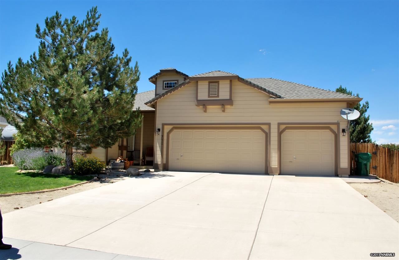 741 Silver Run Drive Reno, NV 89521 - Photo 1 of 1 a front view of a house with a yard