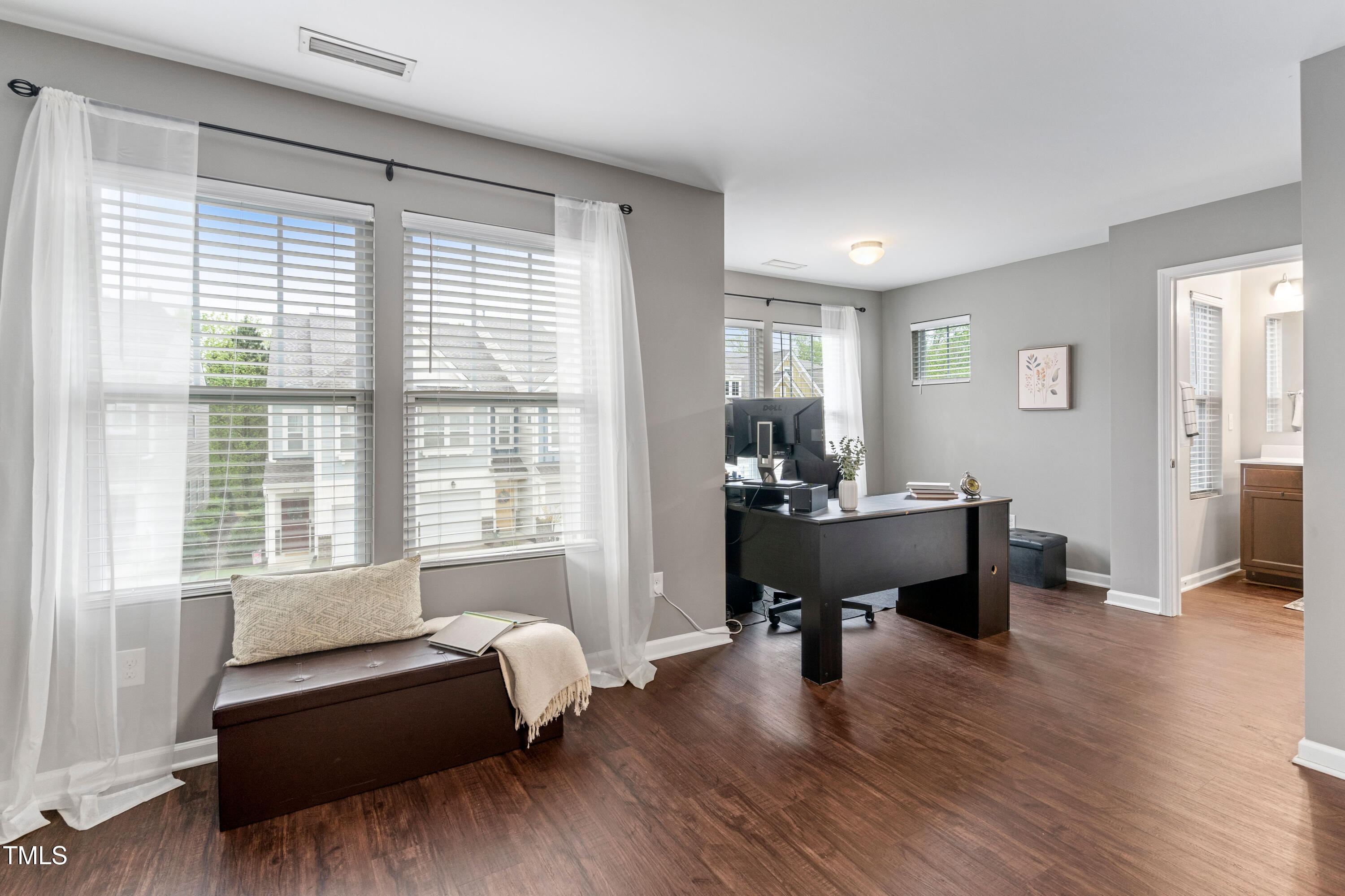624 Metro Station Apex, NC 27502 - Photo 20 of 36 a living room with furniture and a window