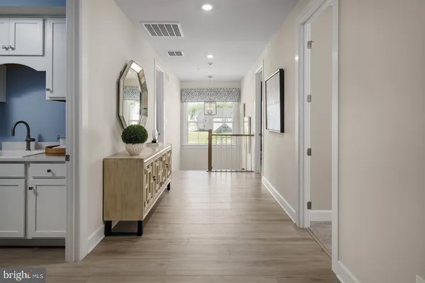 a kitchen with sink cabinets and window