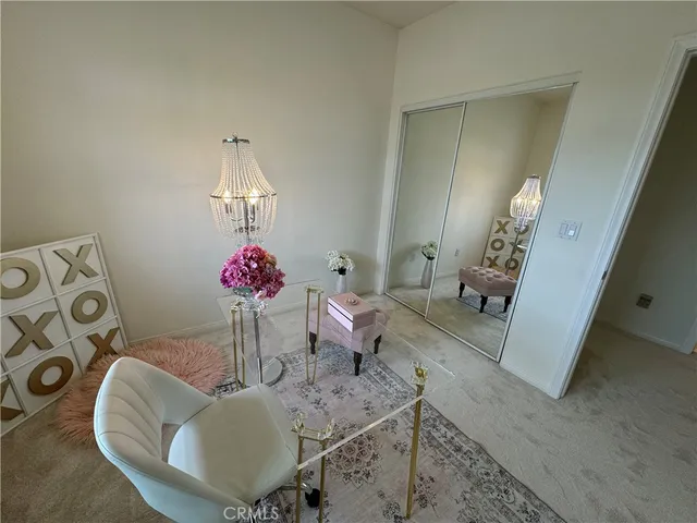 a living room with couches and furniture