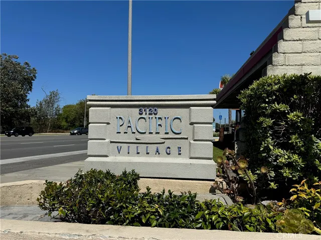 a view of a air conditioner and an empty room