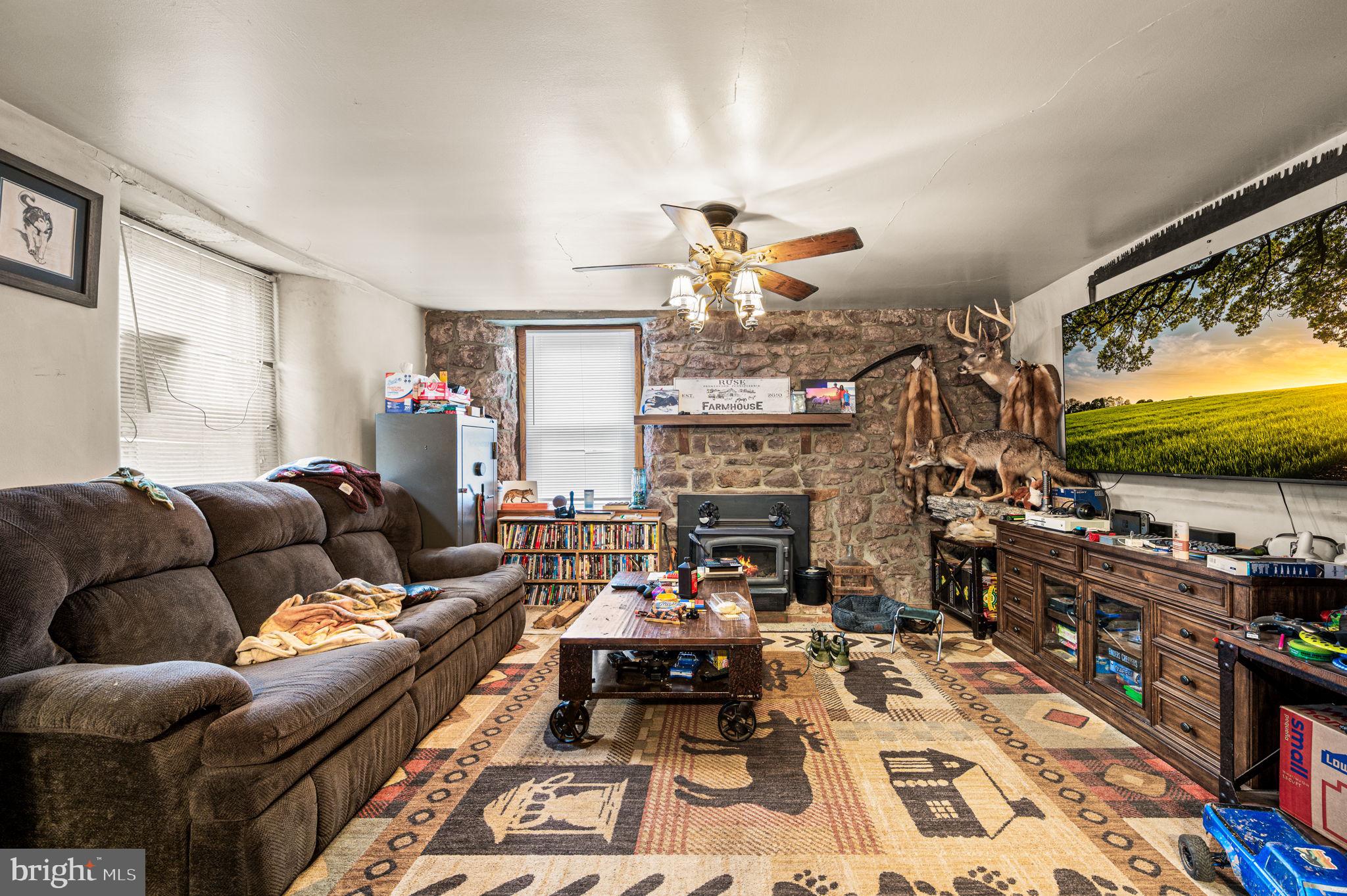 1286 East Schuylkill Road Pottstown, PA 19465 - Photo 5 of 8 Cozy living space with rustic charm.