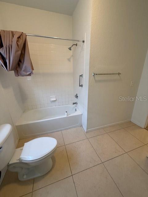 3701 Conroy Road, Unit 1822 Orlando, FL 32839 - Photo 17 of 23 a bathroom with a toilet and a shower