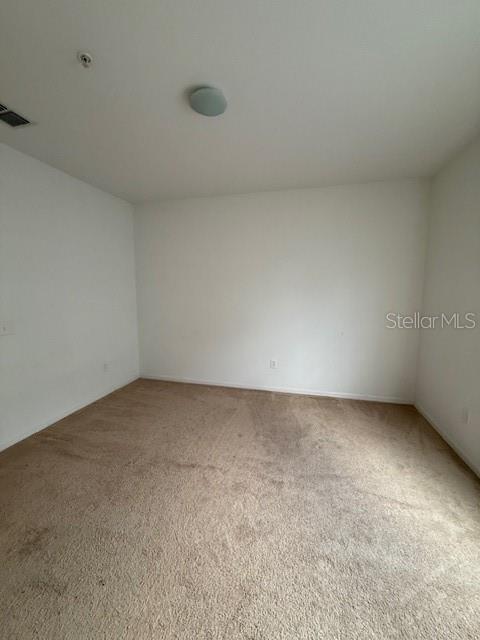 3701 Conroy Road, Unit 1822 Orlando, FL 32839 - Photo 18 of 23 a view of an empty room and chandelier