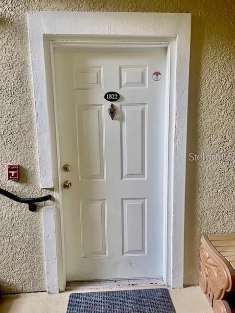 3701 Conroy Road, Unit 1822 Orlando, FL 32839 - Photo 2 of 23 a bathroom with a shower a toilet and a window