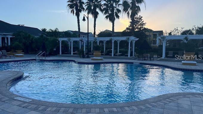 3701 Conroy Road, Unit 1822 Orlando, FL 32839 - Photo 23 of 23 a view of a house with a yard