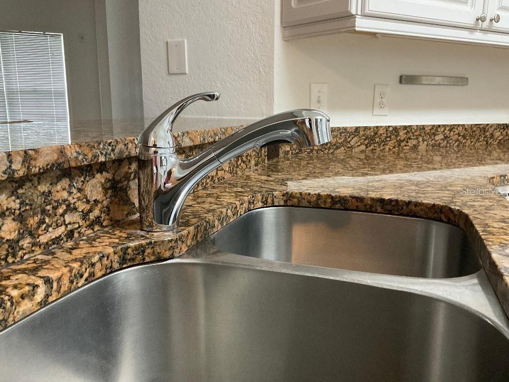 3701 Conroy Road, Unit 1822 Orlando, FL 32839 - Photo 5 of 23 a close view of sink and tap