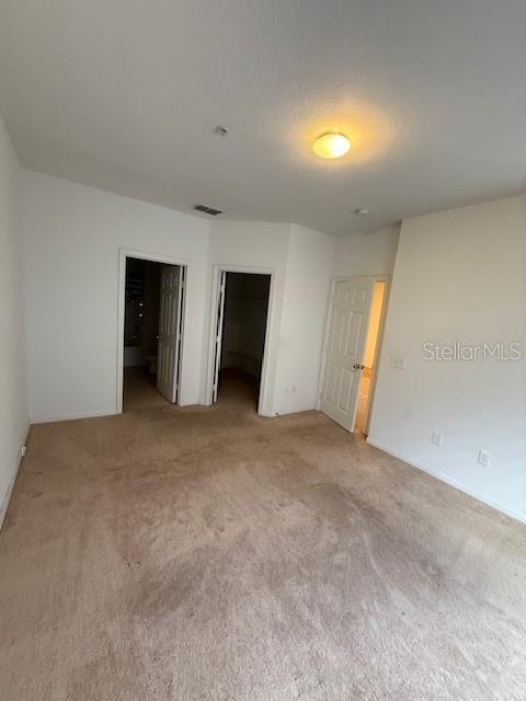 3701 Conroy Road, Unit 1822 Orlando, FL 32839 - Photo 10 of 23 a view of an empty room with a window
