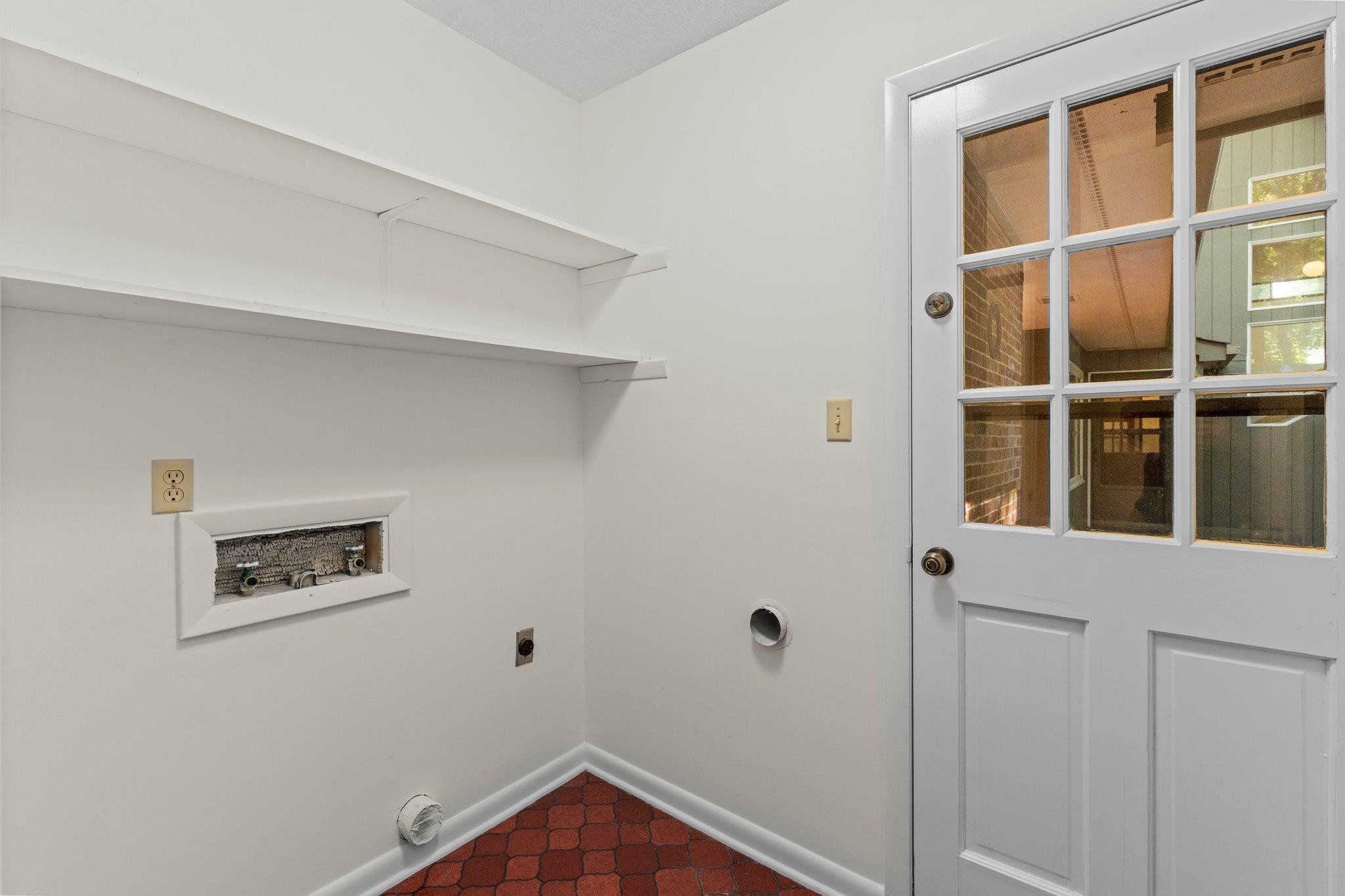 4505 Eliot Place Raleigh, NC 27609 - Photo 34 of 51 Laundry room with w/d connections and access to back deck. Laundry