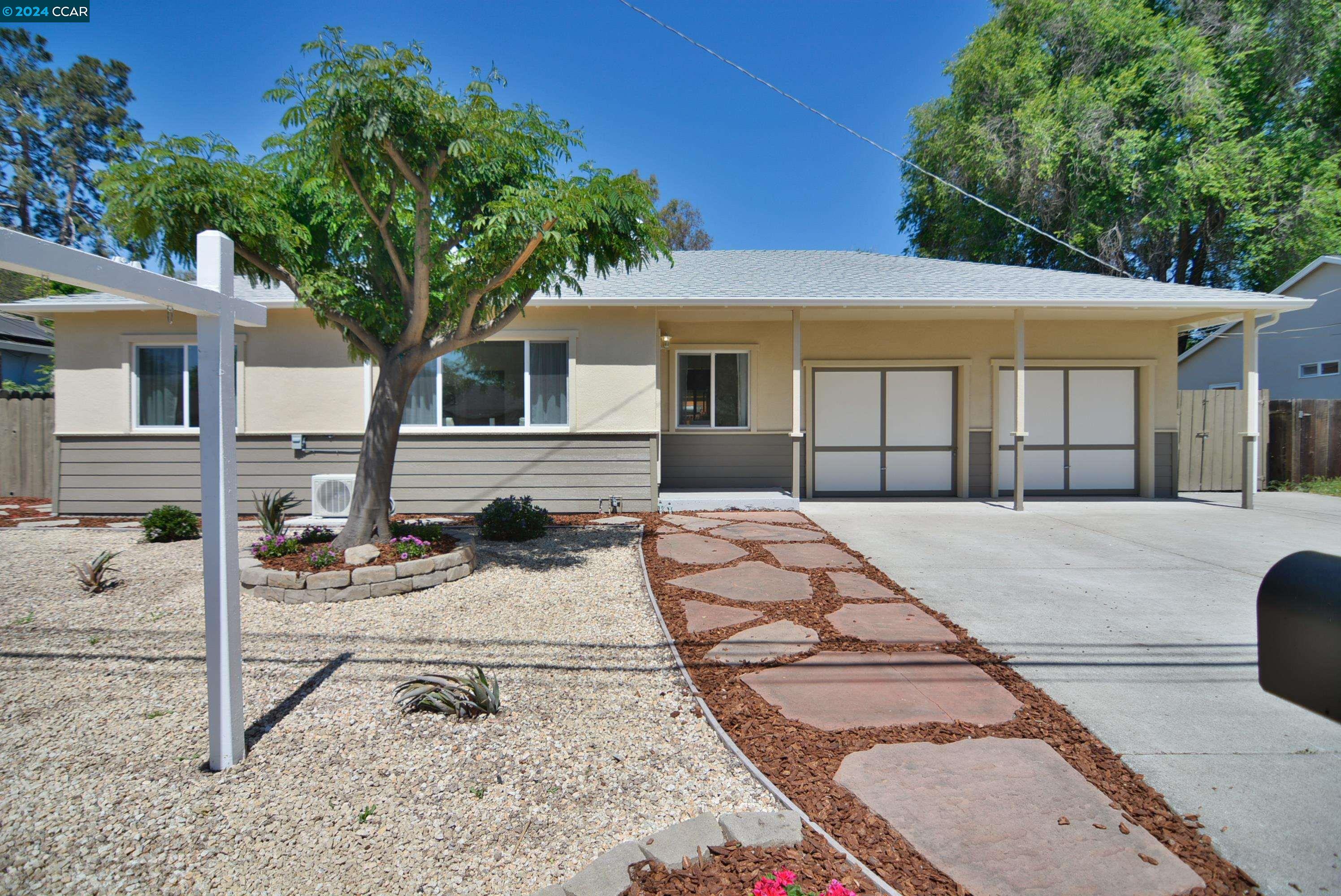 a front view of a house with a patio