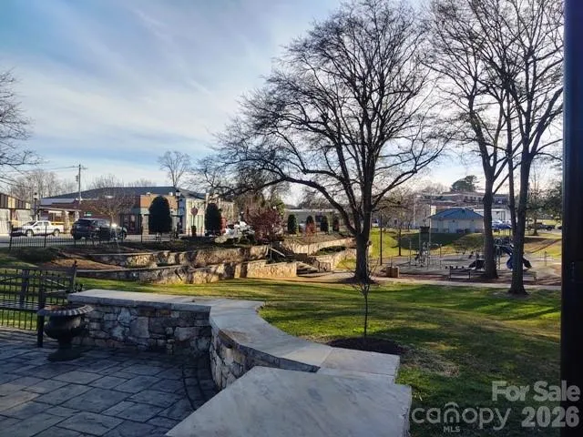 a view of a street with cars