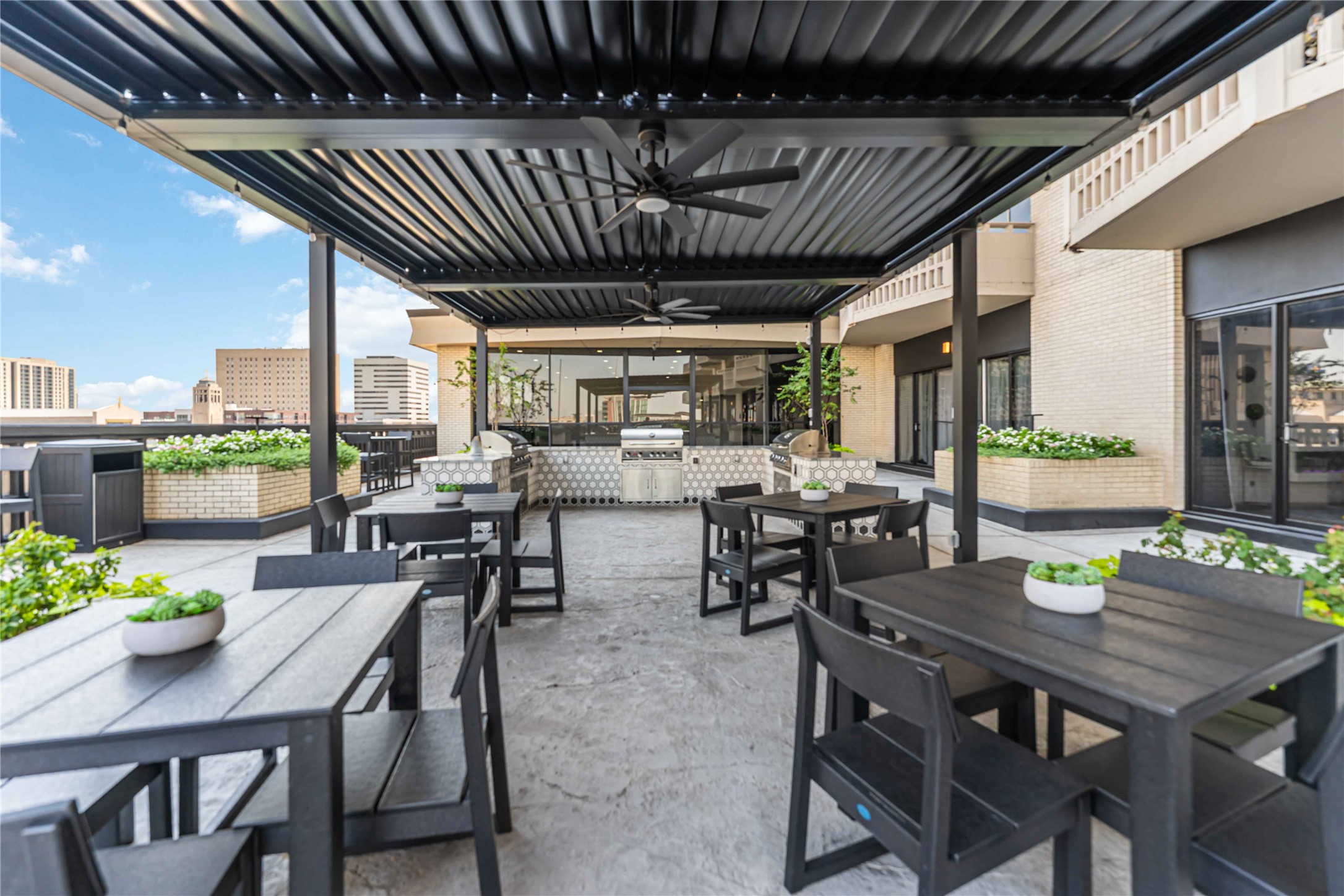 2016 Main Street, Unit 2305 Houston, TX 77002 - Photo 21 of 26 a dining room with furniture a rug and wooden floor