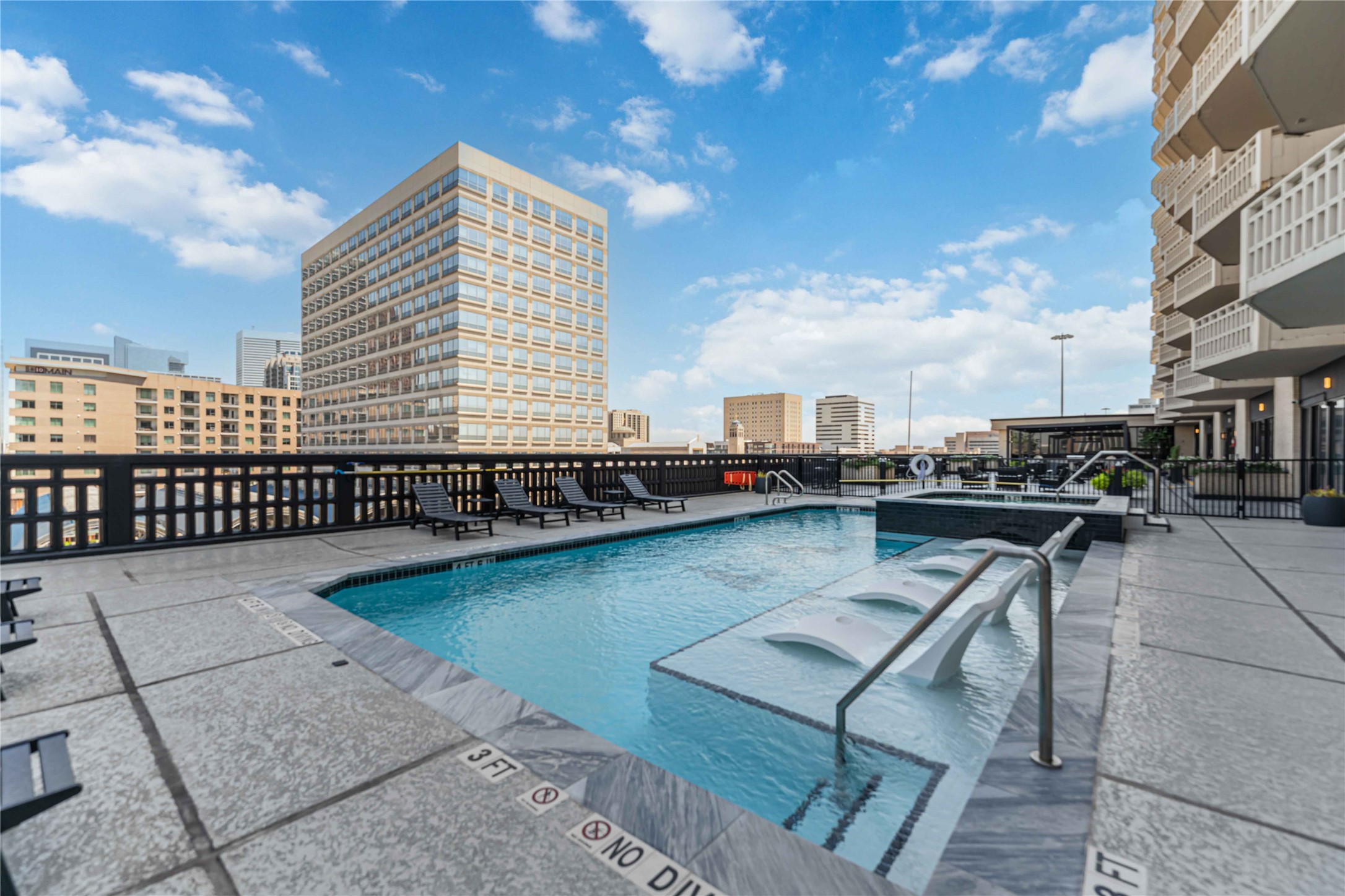 2016 Main Street, Unit 2305 Houston, TX 77002 - Photo 22 of 26 a view of balcony with outdoor seating and city view