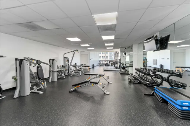 a very nice looking room with gym equipment