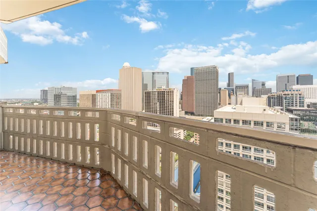 a view of city with tall buildings