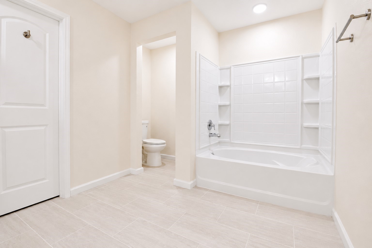 5612 Rainflower Terrace Lane Spring, TX 77389 - Photo 24 of 50 a bathroom with a bathtub and a toilet