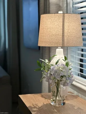 a vase of flowers sitting on a table