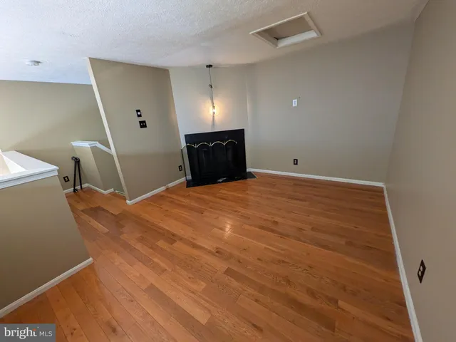 a room with a bed and toilet