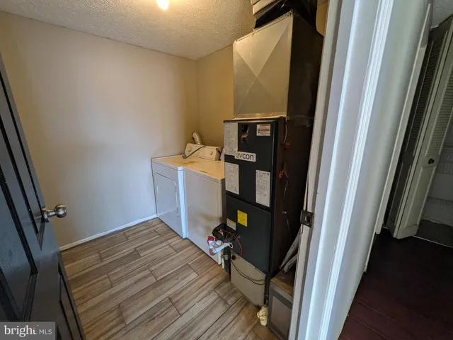 a view of utility room with empty racks