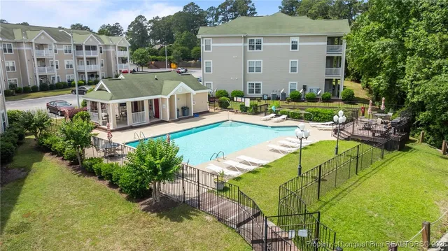 a view of a house with swimming pool